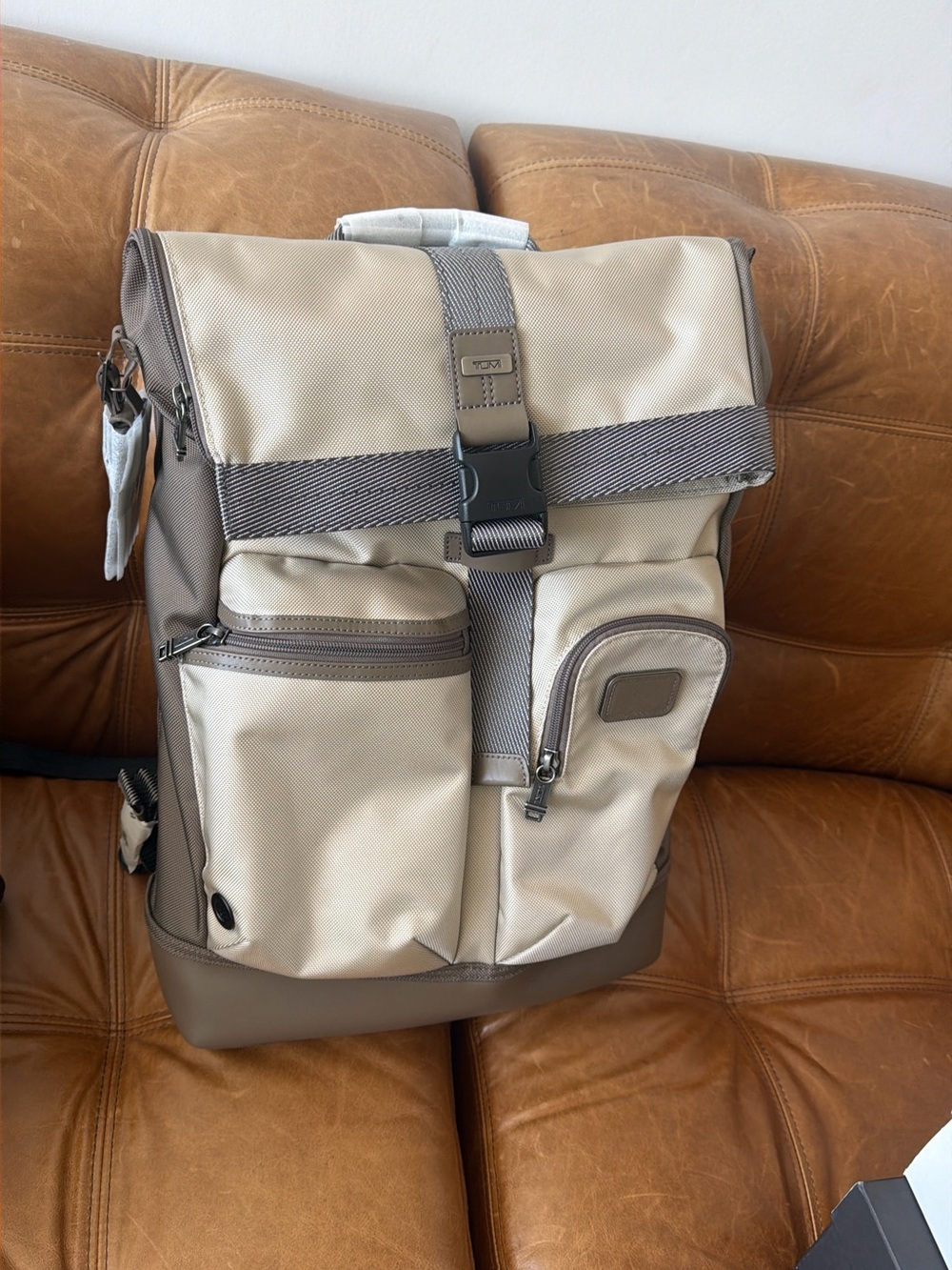 Tumi Beige and Brown Roll-Top Backpack with Front Pockets